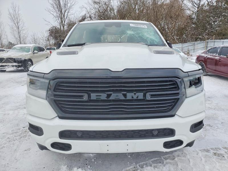 Photo 5 from auction – 2023 RAM 1500 with VIN 1C6SRFVTXPN690641