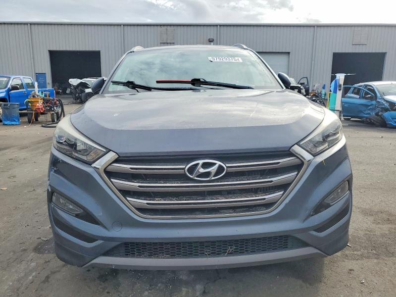 Photo 5 from auction – 2016 HYUNDAI TUCSON with VIN KM8J33A21GU193609