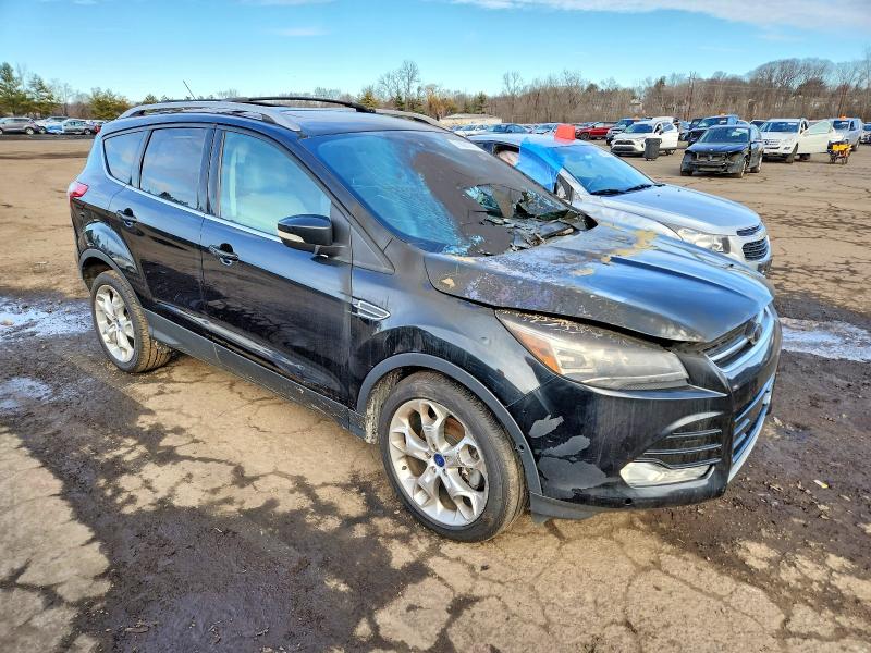 Photo 4 from auction – 2015 FORD ESCAPE TIT with VIN 1FMCU9JX1FUA21292