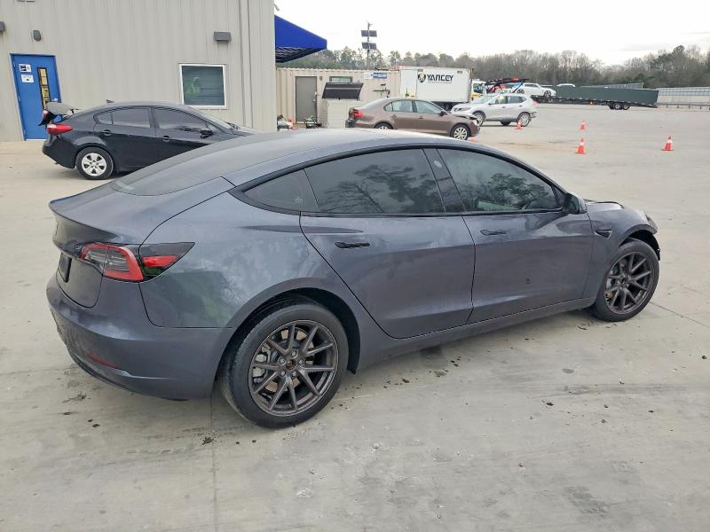 Photo 3 from auction – 2023 TESLA MODEL 3 with VIN 5YJ3E1EA5PF682438