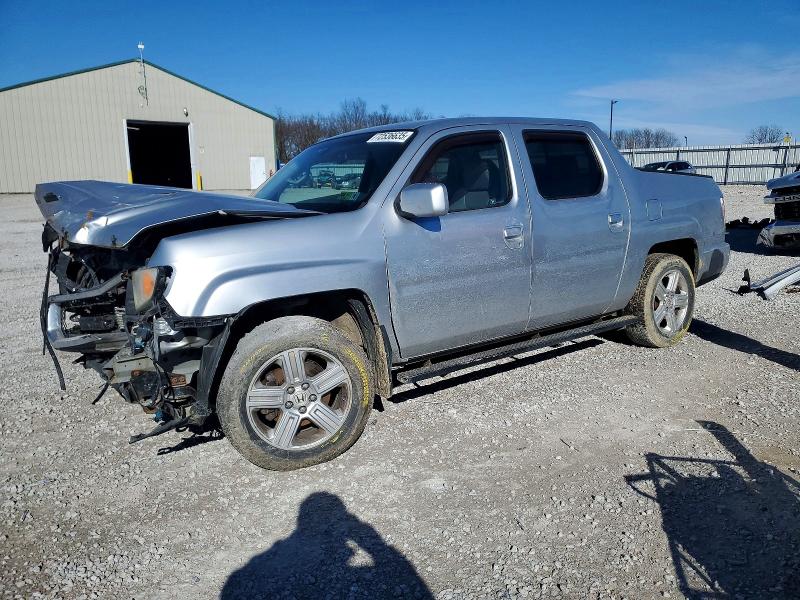 HONDA RIDGELINE 2011 with VIN 5FPYK1F59BB002279 - Photo from auction