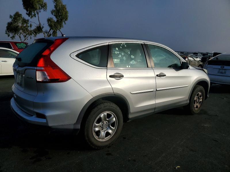 Photo 3 from auction – 2015 HONDA CR-V LX with VIN 5J6RM4H36FL075210