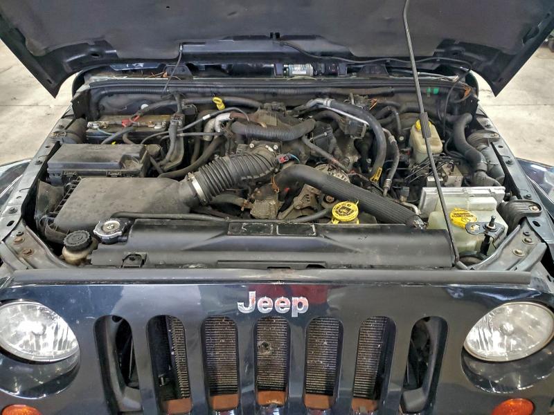 Photo 12 from auction – 2011 JEEP WRANGLER U with VIN 1J4HA5H12BL633797