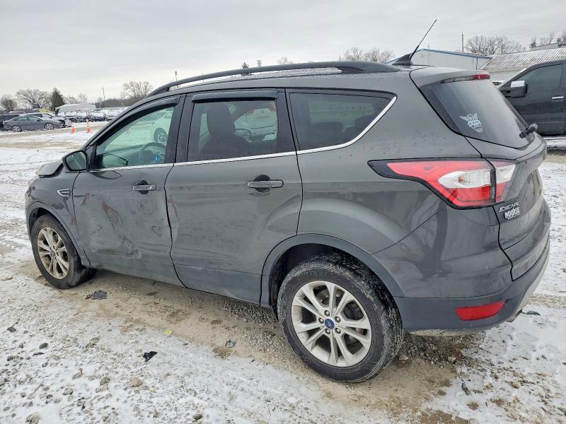 Photo 2 from auction – 2018 FORD ESCAPE with VIN 1FMCU0HD8JUC79339