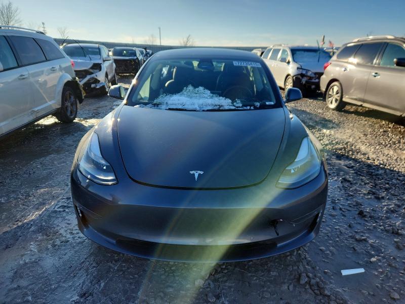 Photo 5 from auction – 2022 TESLA MODEL 3 with VIN 5YJ3E1EB9NF163964
