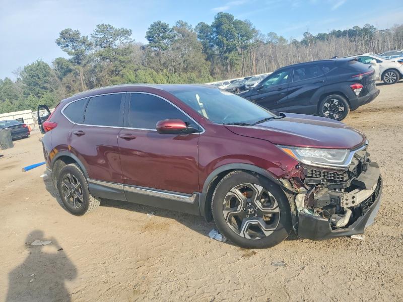 Photo 4 from auction – 2017 HONDA CR-V with VIN 7FARW1H98HE032923