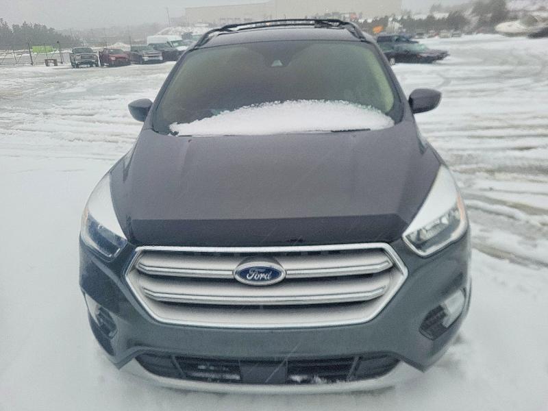 Photo 5 from auction – 2018 FORD ESCAPE SE with VIN 1FMCU9GD0JUD23906