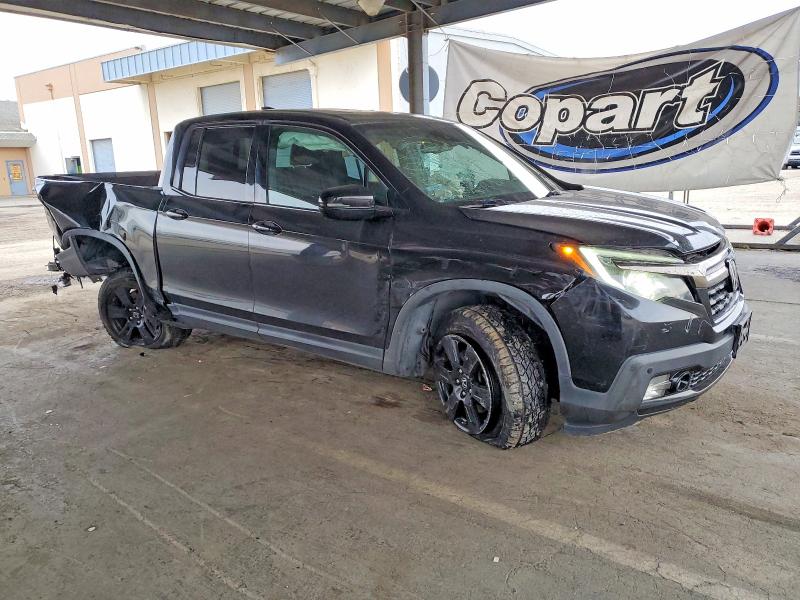 Photo 4 from auction – 2017 HONDA RIDGELINE with VIN 5FPYK3F85HB027551