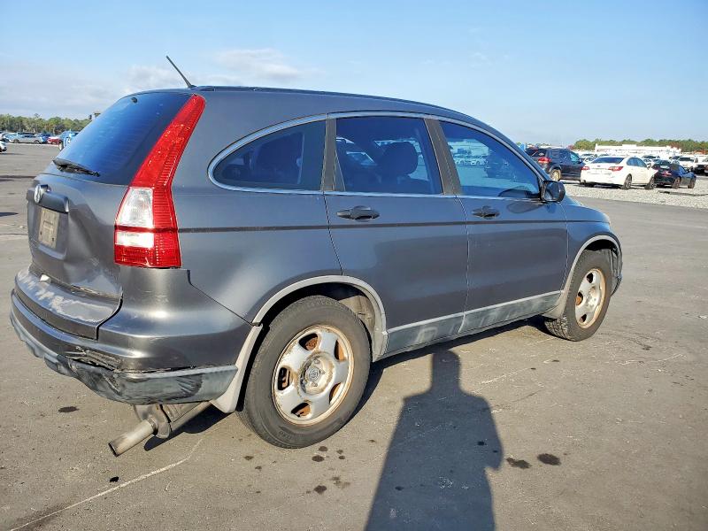 Photo 3 from auction – 2011 HONDA CR-V LX with VIN 5J6RE3H32BL024076