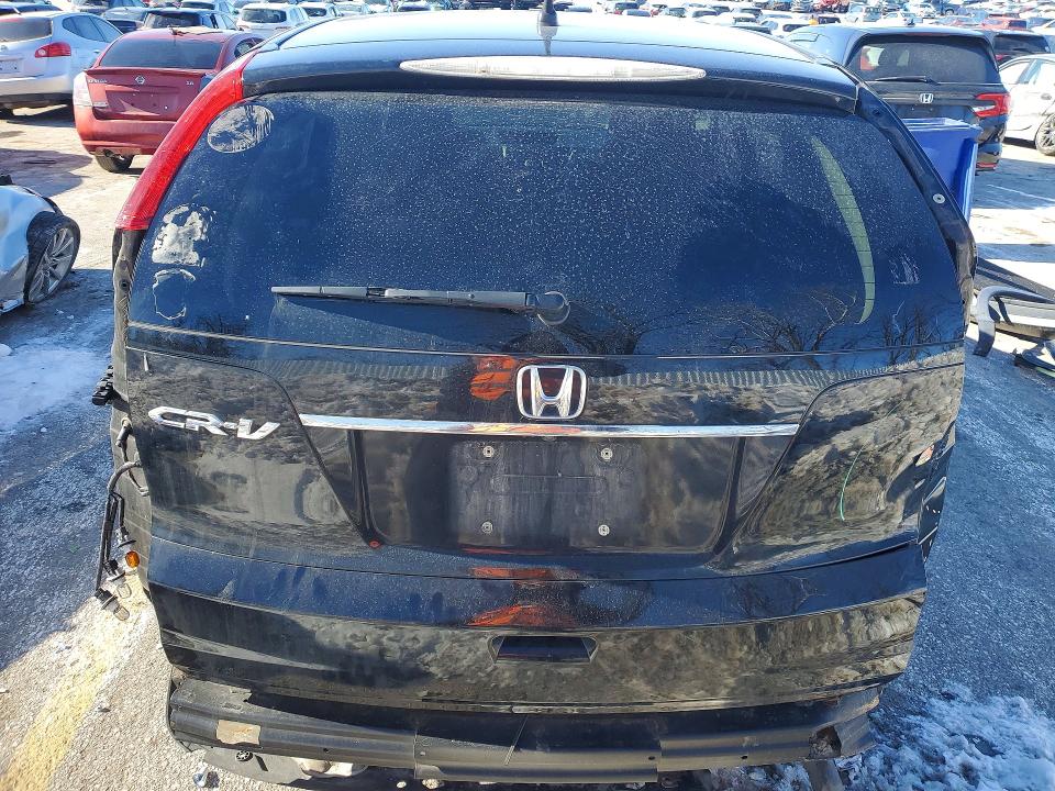 Photo 6 from auction – 2012 HONDA CR-V with VIN 2HKRM3H50CH501359