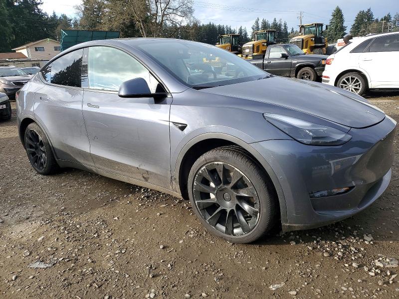 Photo 4 from auction – 2022 TESLA MODEL Y with VIN 7SAYGAEE2NF541023