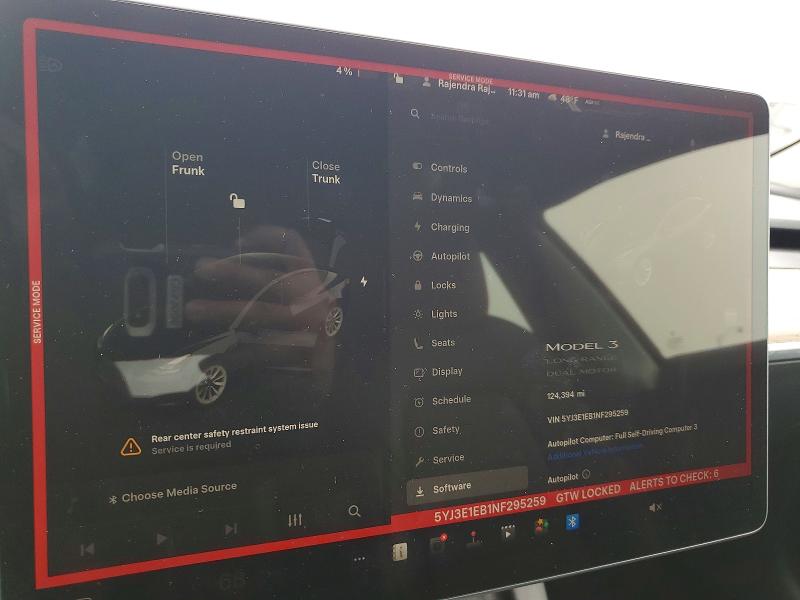 Photo 9 from auction – 2022 TESLA MODEL 3 with VIN 5YJ3E1EB1NF295259