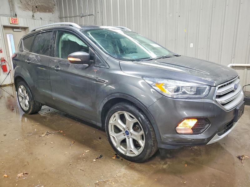 Photo 4 from auction – 2018 FORD ESCAPE with VIN 1FMCU9J98JUC55813