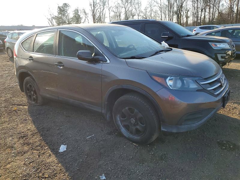 Photo 4 from auction – 2013 HONDA CR-V with VIN 5J6RM4H31DL080408