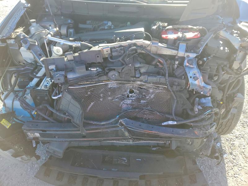 Photo 12 from auction – 2015 NISSAN ROGUE S with VIN KNMAT2MV3FP576579