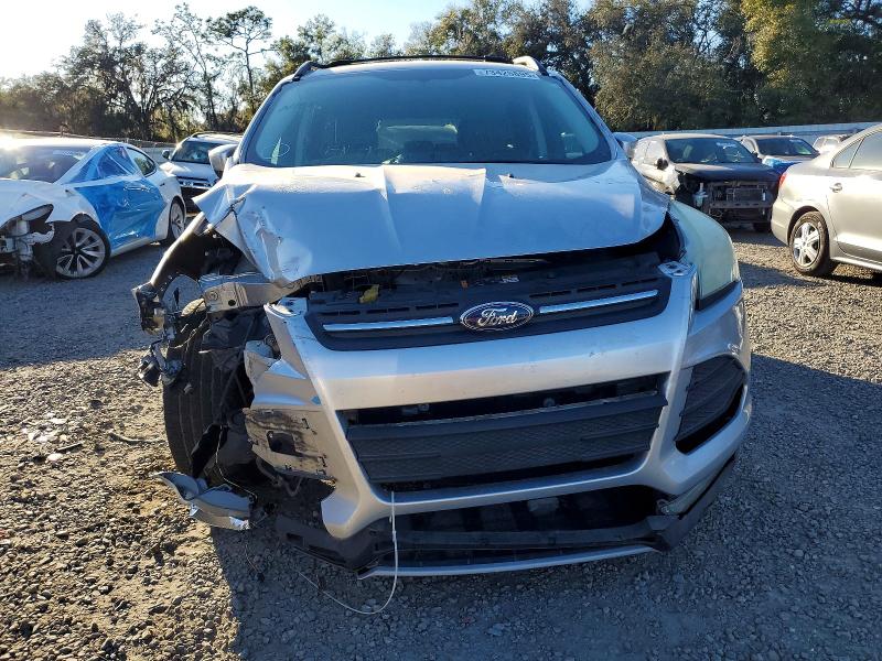 Photo 5 from auction – 2013 FORD ESCAPE with VIN 1FMCU0G94DUD07641