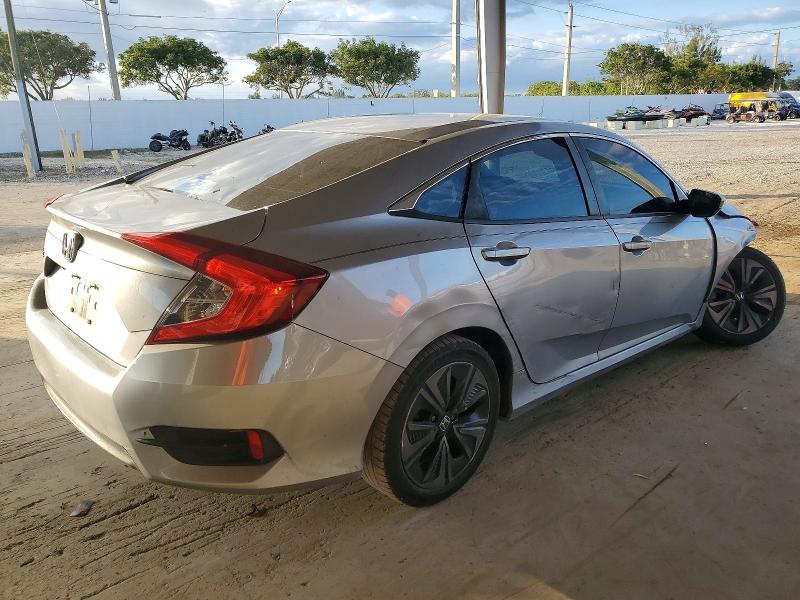 Photo 3 from auction – 2018 HONDA CIVIC with VIN 19XFC2F55JE011665