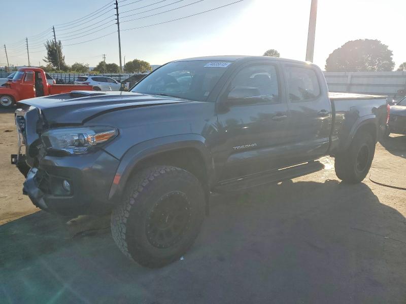 TOYOTA TACOMA 2016 with VIN 3TMDZ5BN3GM009554 - Photo from auction