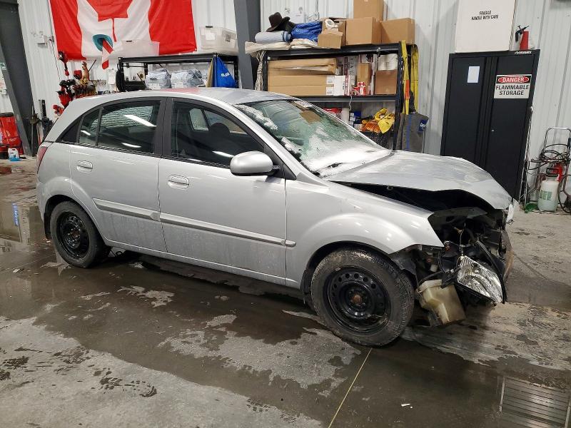 Photo 4 from auction – 2010 KIA RIO LX with VIN KNADH5B38A6615969