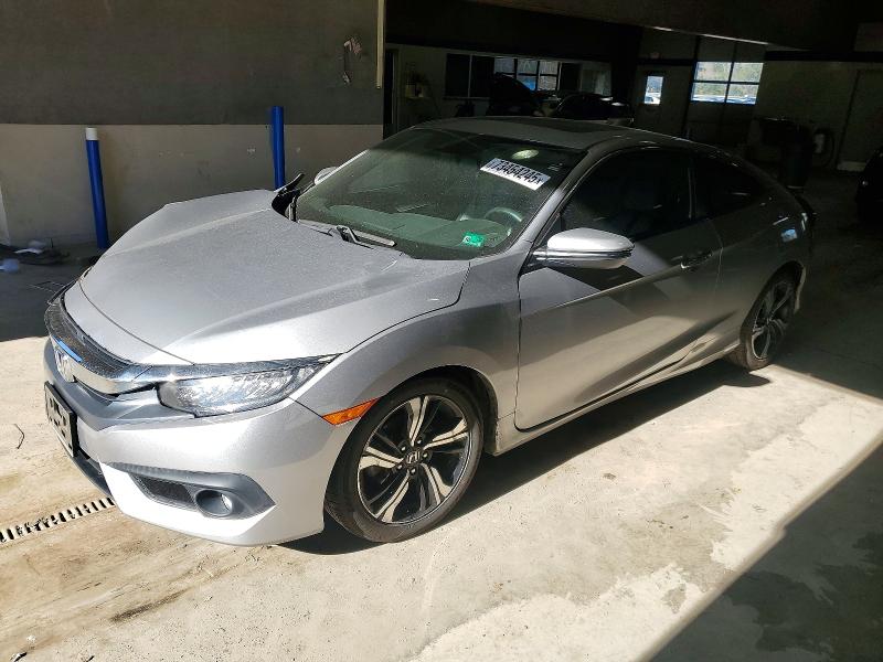 HONDA CIVIC TOUR 2016 with VIN 2HGFC3B95GH361780 - Photo from auction