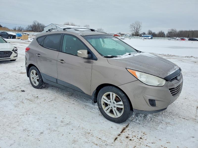 Photo 4 from auction – 2012 HYUNDAI TUCSON GLS with VIN KM8JUCAC3CU395576