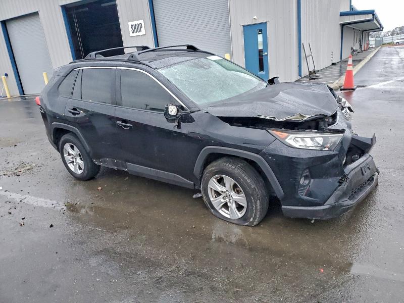 Photo 4 from auction – 2019 TOYOTA RAV4 XLE with VIN JTMP1RFV6KD009350