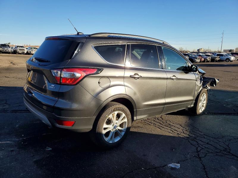Photo 3 from auction – 2018 FORD ESCAPE SE with VIN 1FMCU9GD0JUA42155