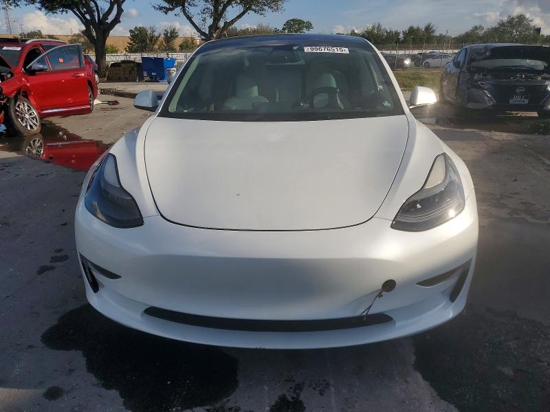 Photo 5 from auction – 2023 TESLA MODEL 3 with VIN 5YJ3E1EA4PF512720