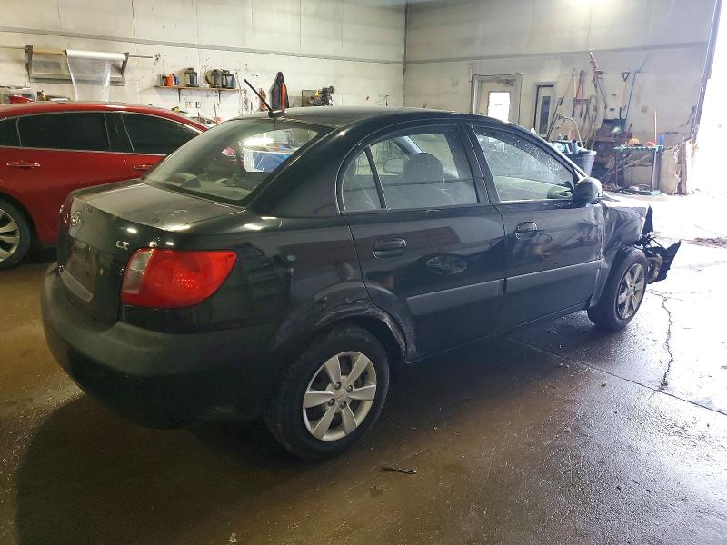 Photo 3 from auction – 2009 KIA RIO BASE with VIN KNADE223296449421