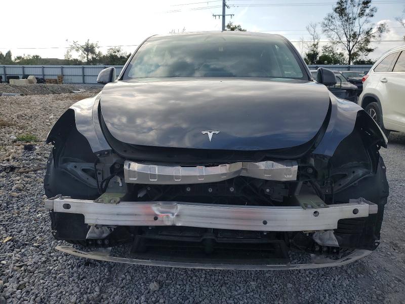 Photo 5 from auction – 2023 TESLA MODEL Y with VIN 7SAYGDEEXPF591463