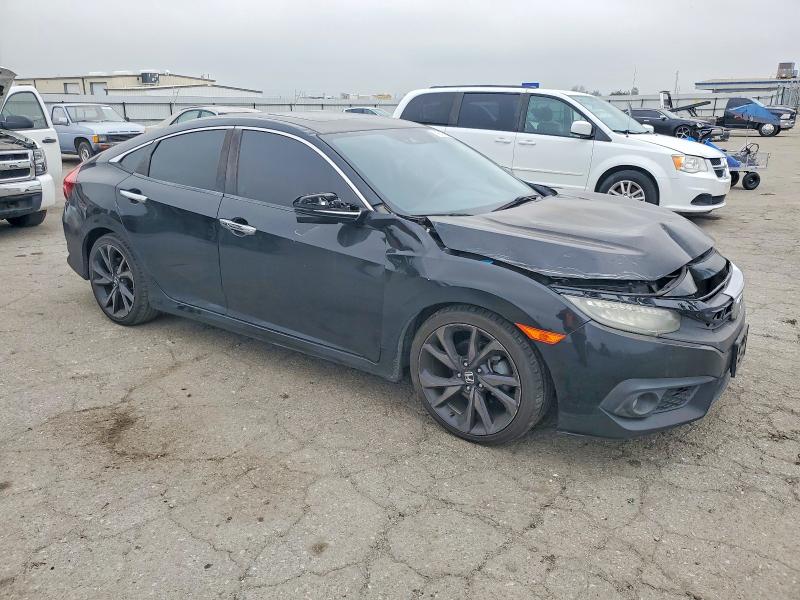 Photo 4 from auction – 2016 HONDA CIVIC TOUR with VIN 2HGFC1F90GH648491