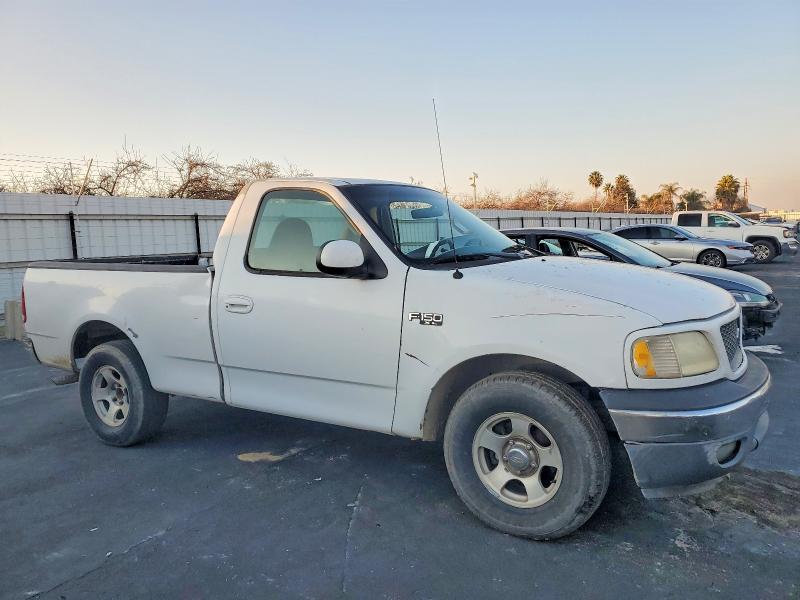 Photo 4 from auction – 2000 FORD F150 with VIN 1FTRF17W7YKA38220