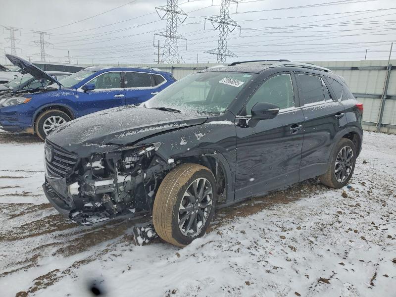 MAZDA CX-5 GT 2016 with VIN JM3KE4DY9G0622695 - Photo from auction