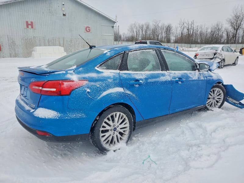 Photo 3 from auction – 2015 FORD FOCUS TITA with VIN 1FADP3J27FL201003