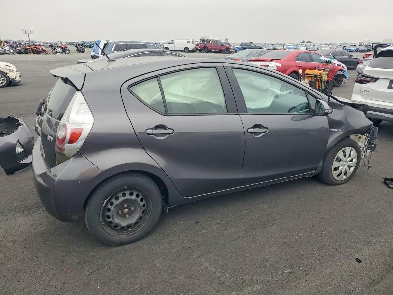 Photo 3 from auction – 2014 TOYOTA PRIUS C with VIN JTDKDTB34E1066767