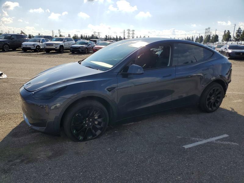 TESLA MODEL Y 2022 con VIN 7SAYGDEE0NA019618 - Foto de la subasta