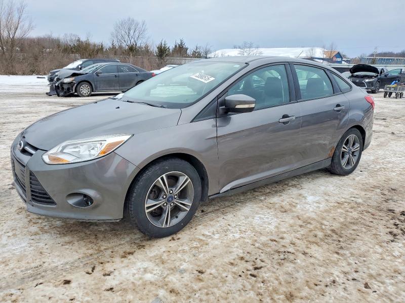 FORD FOCUS 2014 with VIN 1FADP3F27EL148066 - Photo from auction