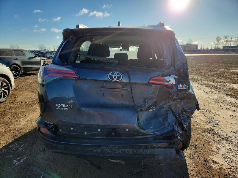 Photo 6 from auction – 2017 TOYOTA RAV4 LE with VIN 2T3BFREV7HW556667