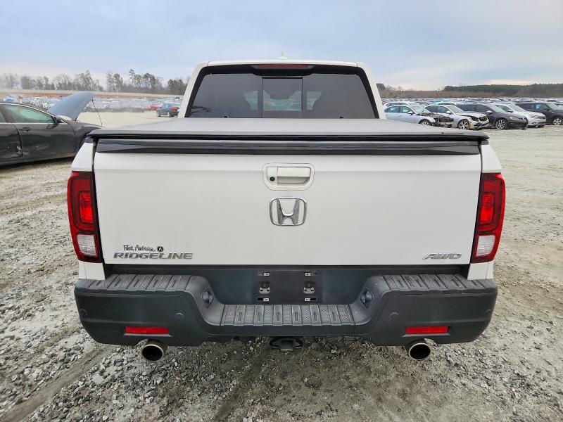 Photo 6 from auction – 2022 HONDA RIDGELINE with VIN 5FPYK3F70NB025824