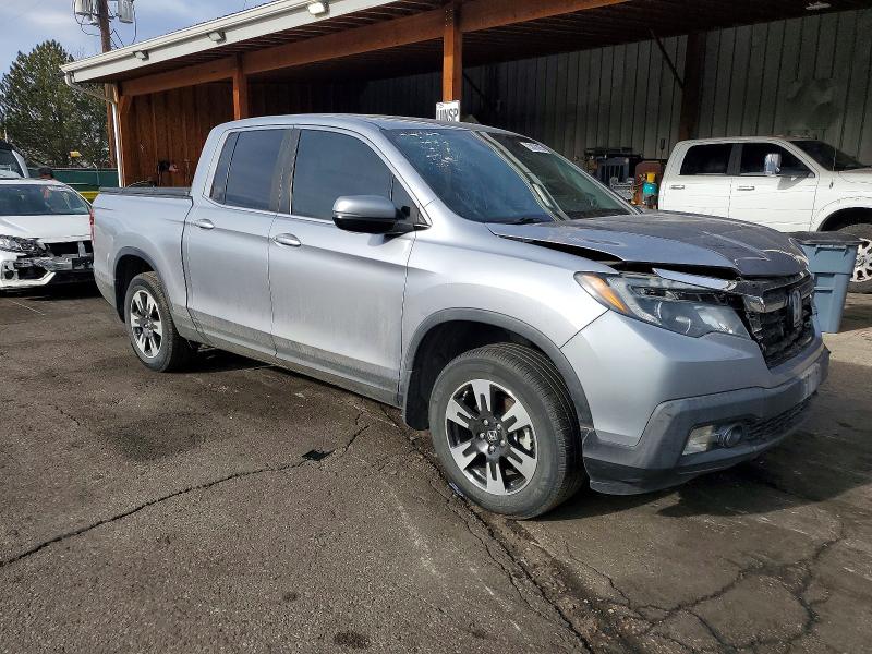 Photo 4 from auction – 2020 HONDA RIDGELINE with VIN 5FPYK3F52LB012939