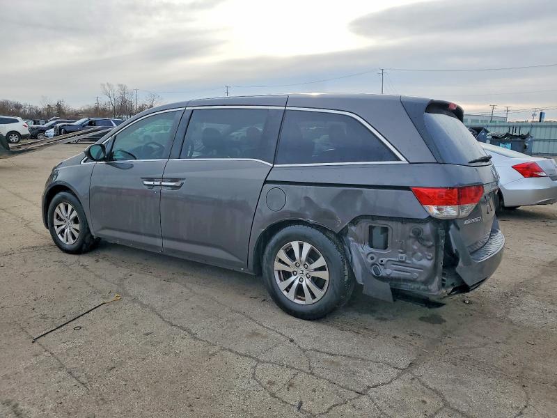 Photo 2 from auction – 2014 HONDA ODYSSEY with VIN 5FNRL5H60EB065492