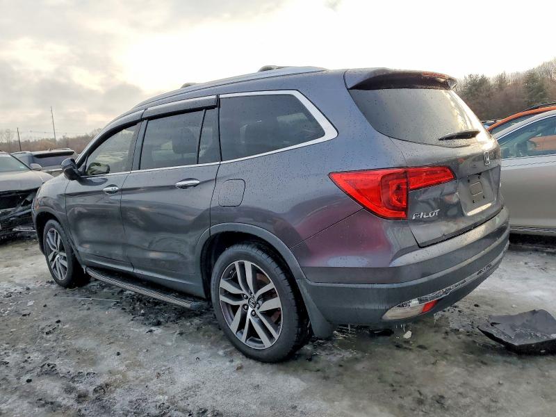Photo 2 from auction – 2017 HONDA PILOT TOUR with VIN 5FNYF6H94HB059363