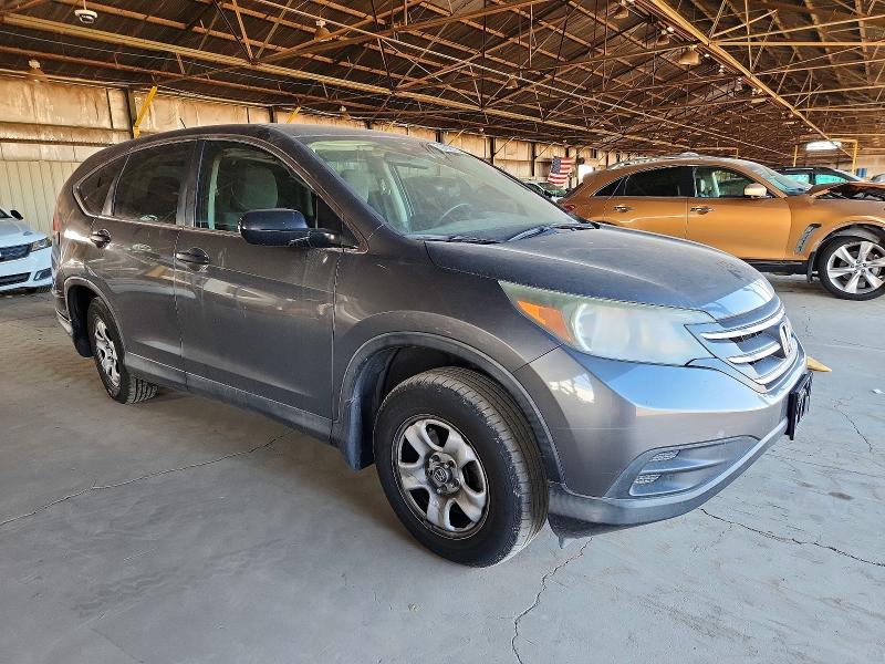 Photo 4 from auction – 2014 HONDA CR-V with VIN 3CZRM3H32EG713426