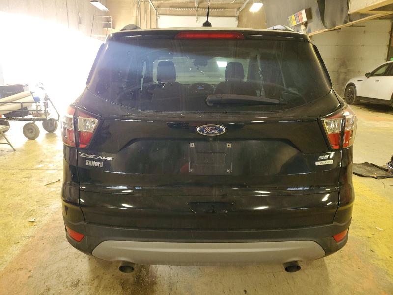Photo 6 from auction – 2018 FORD ESCAPE SE with VIN 1FMCU0GD9JUC40843