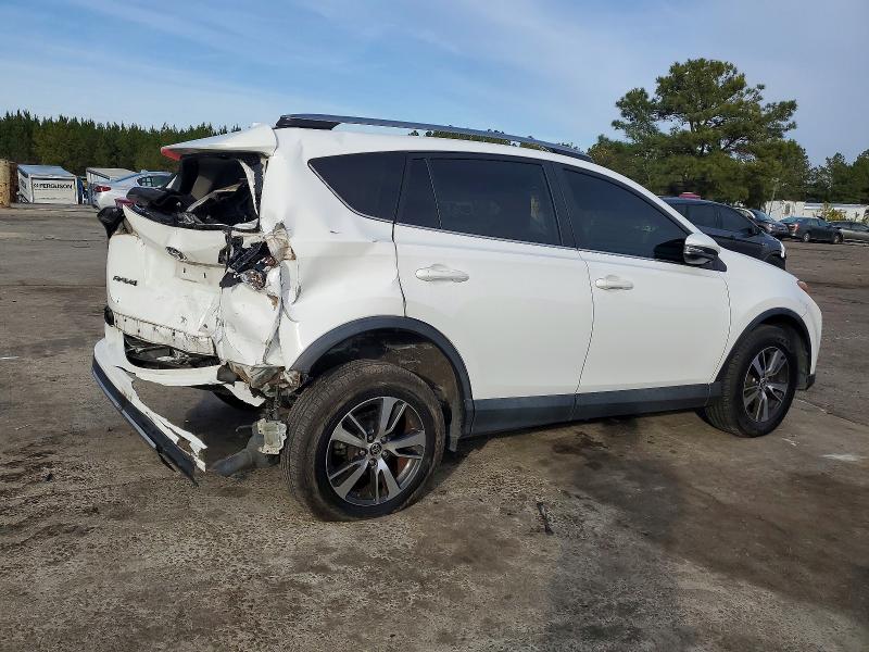 Photo 3 from auction – 2018 TOYOTA RAV4 with VIN 2T3WFREV6JW443218