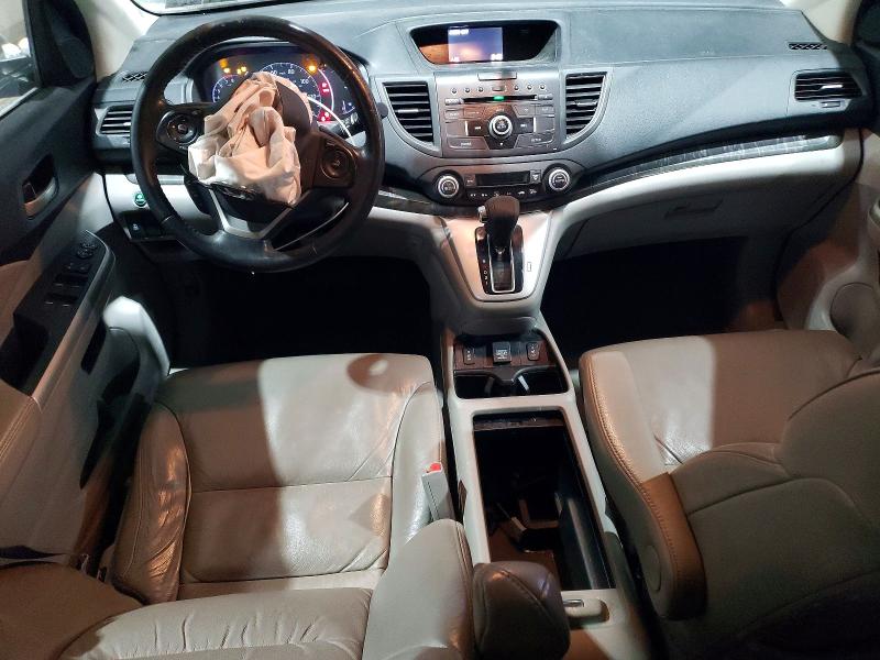 Photo 8 from auction – 2014 HONDA CR-V with VIN 2HKRM4H71EH657694