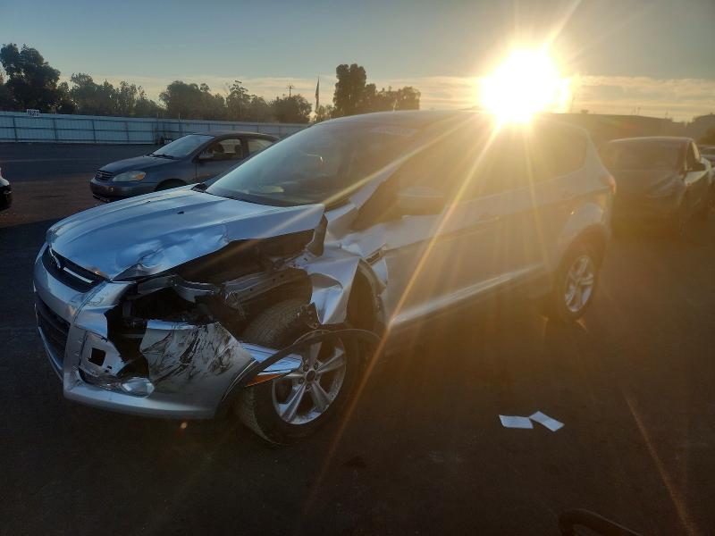 FORD ESCAPE 2014 with VIN 1FMCU0GX9EUC23444 - Photo from auction