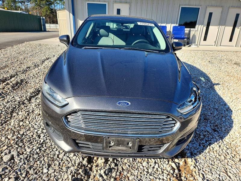 Photo 5 from auction – 2016 FORD FUSION S with VIN 3FA6P0G77GR327844