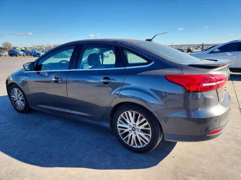 Photo 2 from auction – 2015 FORD FOCUS TITA with VIN 1FADP3J24FL384599