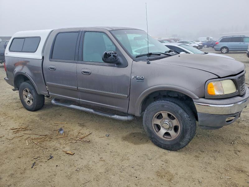 Photo 4 from auction – 2002 FORD F150 SUPER with VIN 1FTRW08L22KD39029